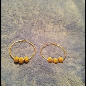 Brand new gold hoop earrings with mesh balls