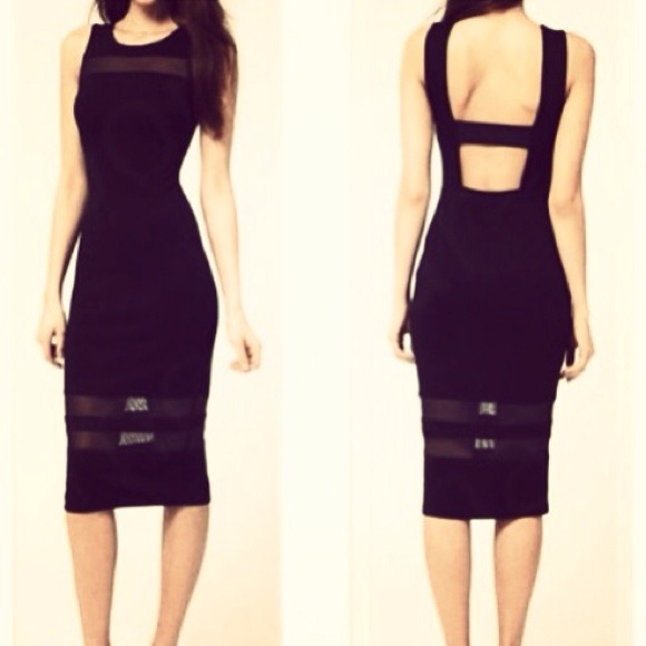 Dresses & Skirts - SOLD OUT 🎉HOST PICK🎉 Sleek Sexy Black Dress