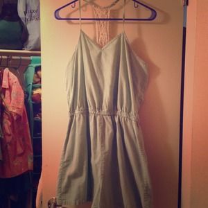 Light green romper with lacy back