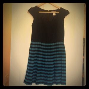 Super cute teal and black pleated dress.