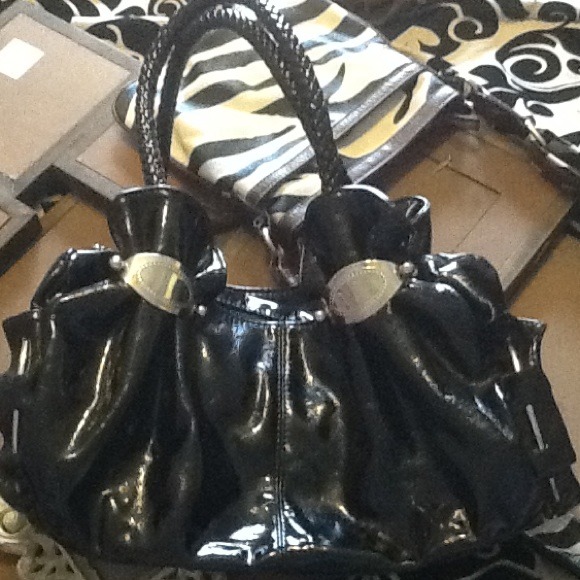 Big shiny black purse