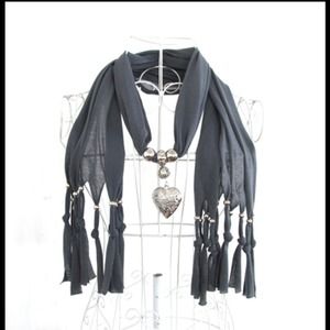 Grey scarf with jewelry