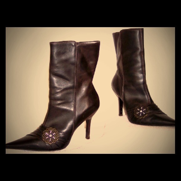 Steve Madden mid-calf leather boots.