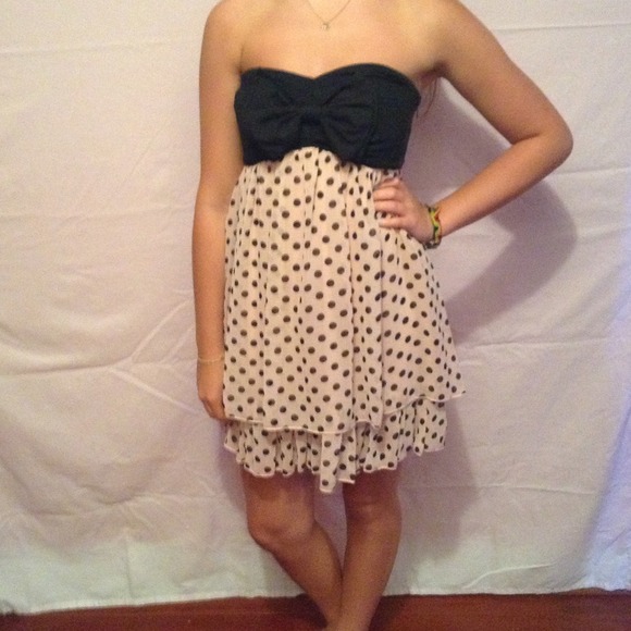 Strapless, bow and polka dot dress.