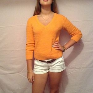 Orange v-neck knit sweater