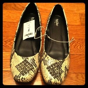 snakeskin embellished flats