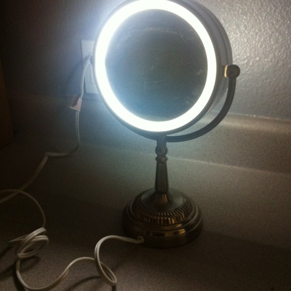 Double sided vanity makeup mirror.