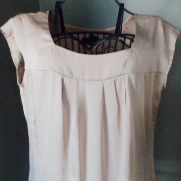 Beige cap sleeve shirt