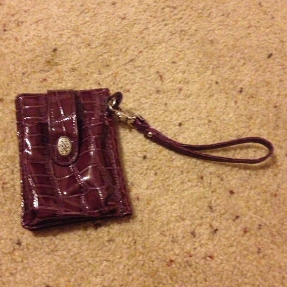 Purple snakeskin wristlet