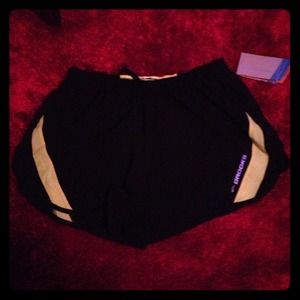 Black/bright yellow running shorts