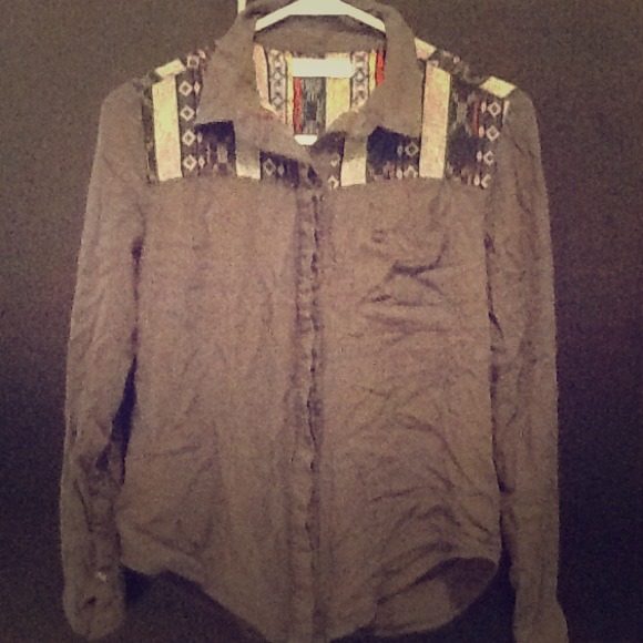 Buttoned up long sleeved shirt