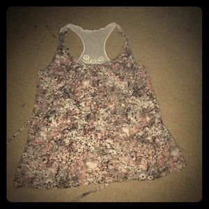 **Cute floral top with knit accent**