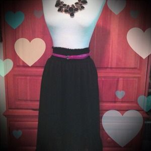 Black high-low skirt with ruffle detail