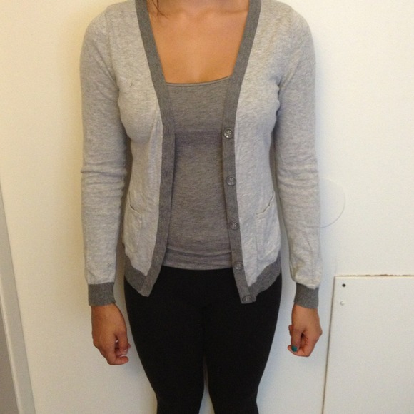 Dark and light gray sweater.