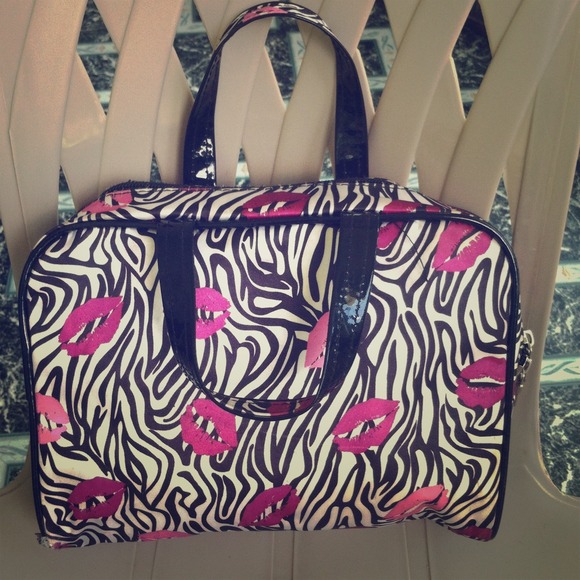 Makeup bag zebra with purple lips great condition