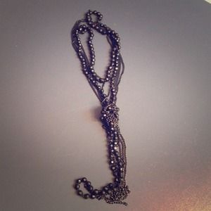 Express long knotted multi-chain black necklace