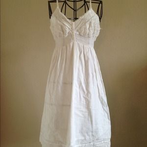 White summer cotton dress with buttons and trim