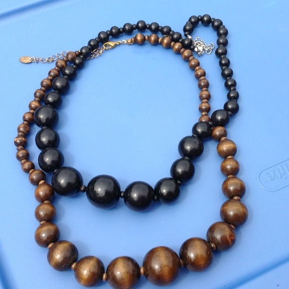 2 wooden bead necklaces