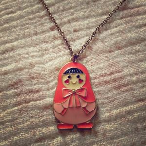 Coral doll necklace