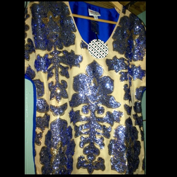 Dressy creme/blue top with black/blue sequence.