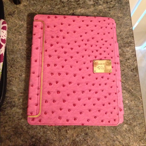 Pink and gold iPad case with snap closure
