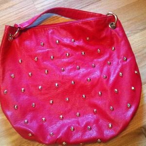 Giant red studded bag