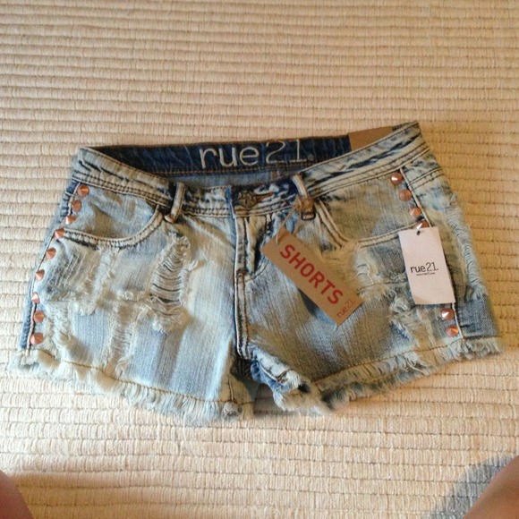Distressed studded shorts