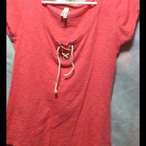 Peachish color shirt