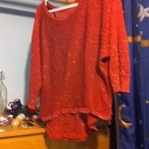 Over top you can wear it over a bando