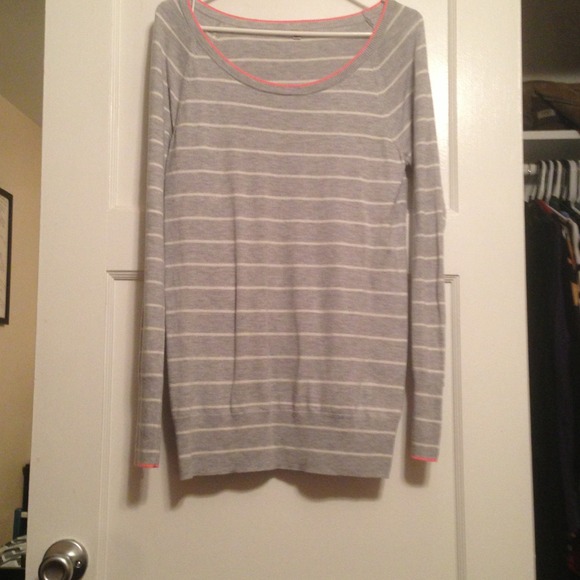 Grey and white striped sweater with neon pink trim