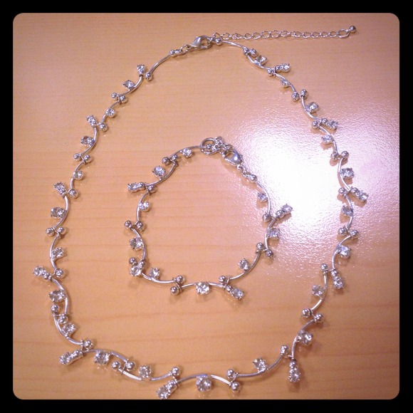 White rhinestone necklace and bracelet.