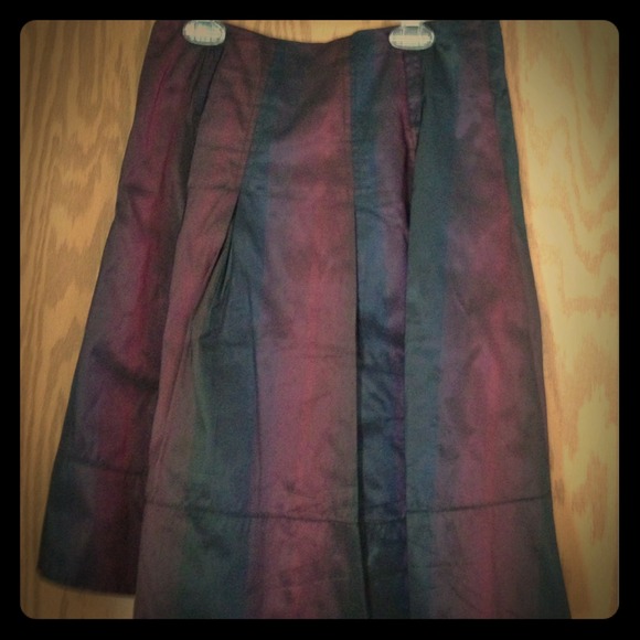 Burgundy, black skirt