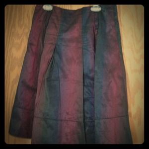 Burgundy, black skirt
