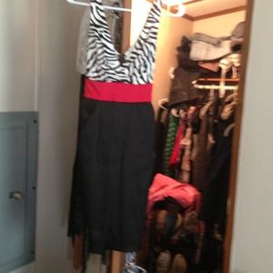 V neck, V back, pockets on sides