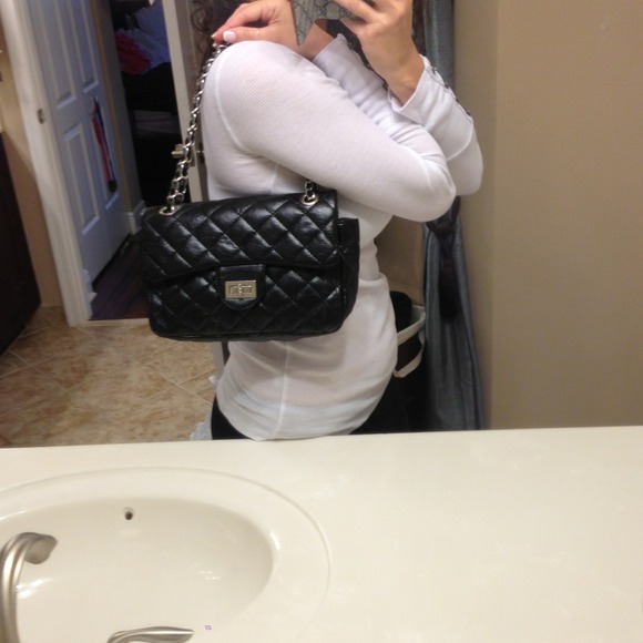 Black quilted handbag