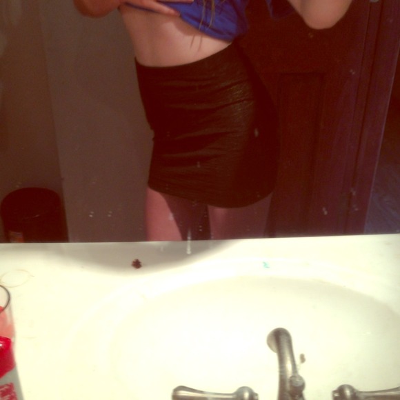 Short black tinted gold pencil skirt