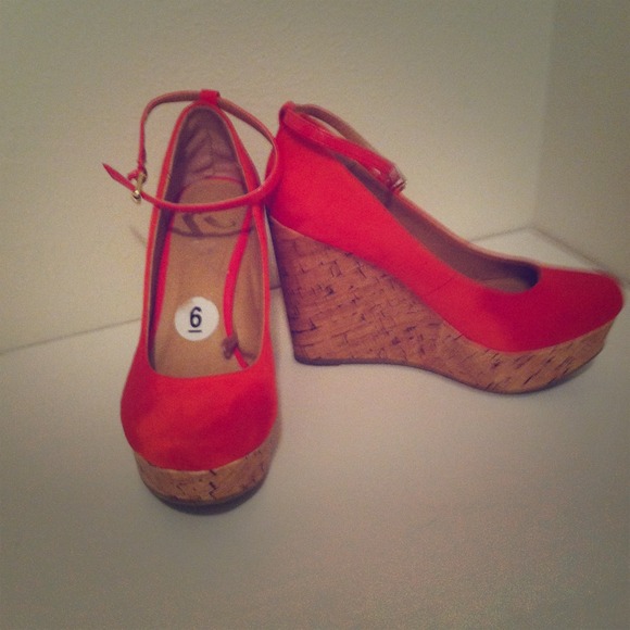 Coral wedges with ankle strap.