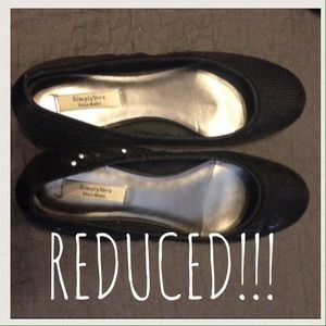 Sequined black ballet flats.