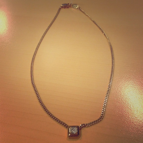 Costume jewelry. With white rhinestone.