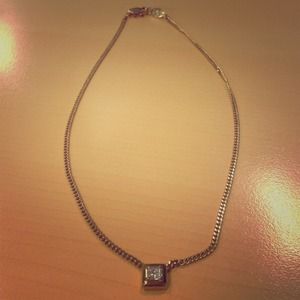 Costume jewelry. With white rhinestone.