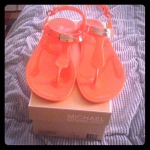 Michael Kors jelly sandals in orange