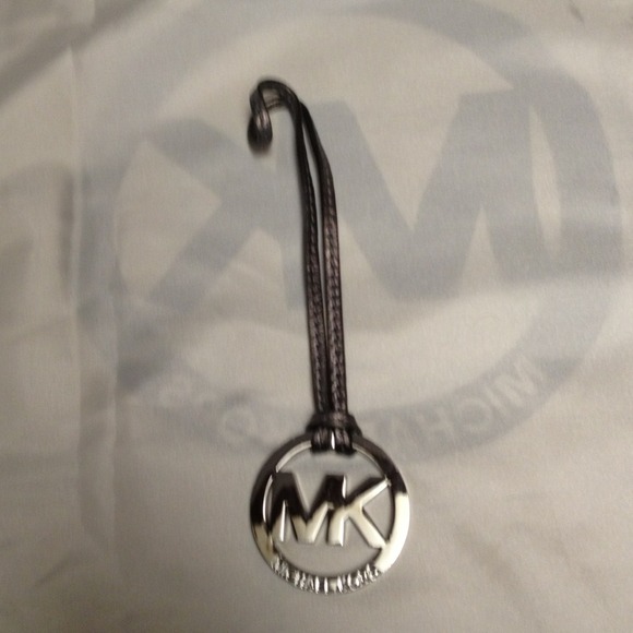 👏Sold👏Authentic Michael Kors Medallion.