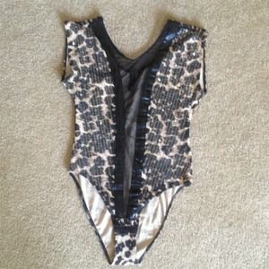 Leopard print body suit.