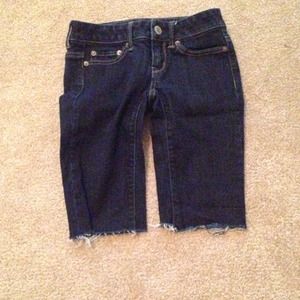 3 quarter length American Eagle shorts.