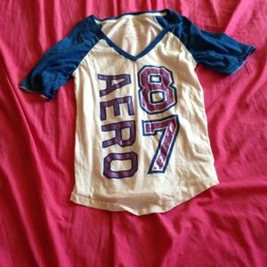 Quarter length tee.