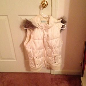 Vest. Cream color with brown/grey fur.