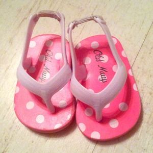 Pink polka dot flip flops