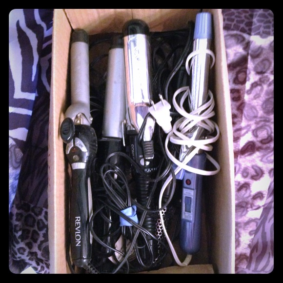 Box of curling iron and blow dry round tools