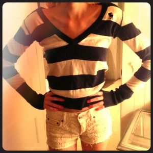 A striped Abercrombie sweater. (Blue and white)