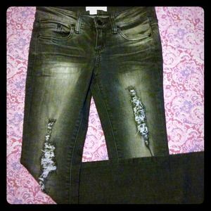 Black denim distressed skinny jeans